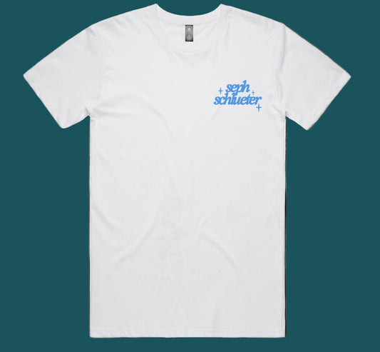 White t-shirt with blue Seph Schlueter on the wear left chest